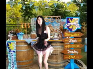 Asian teen celebrates oktoberfest in munich